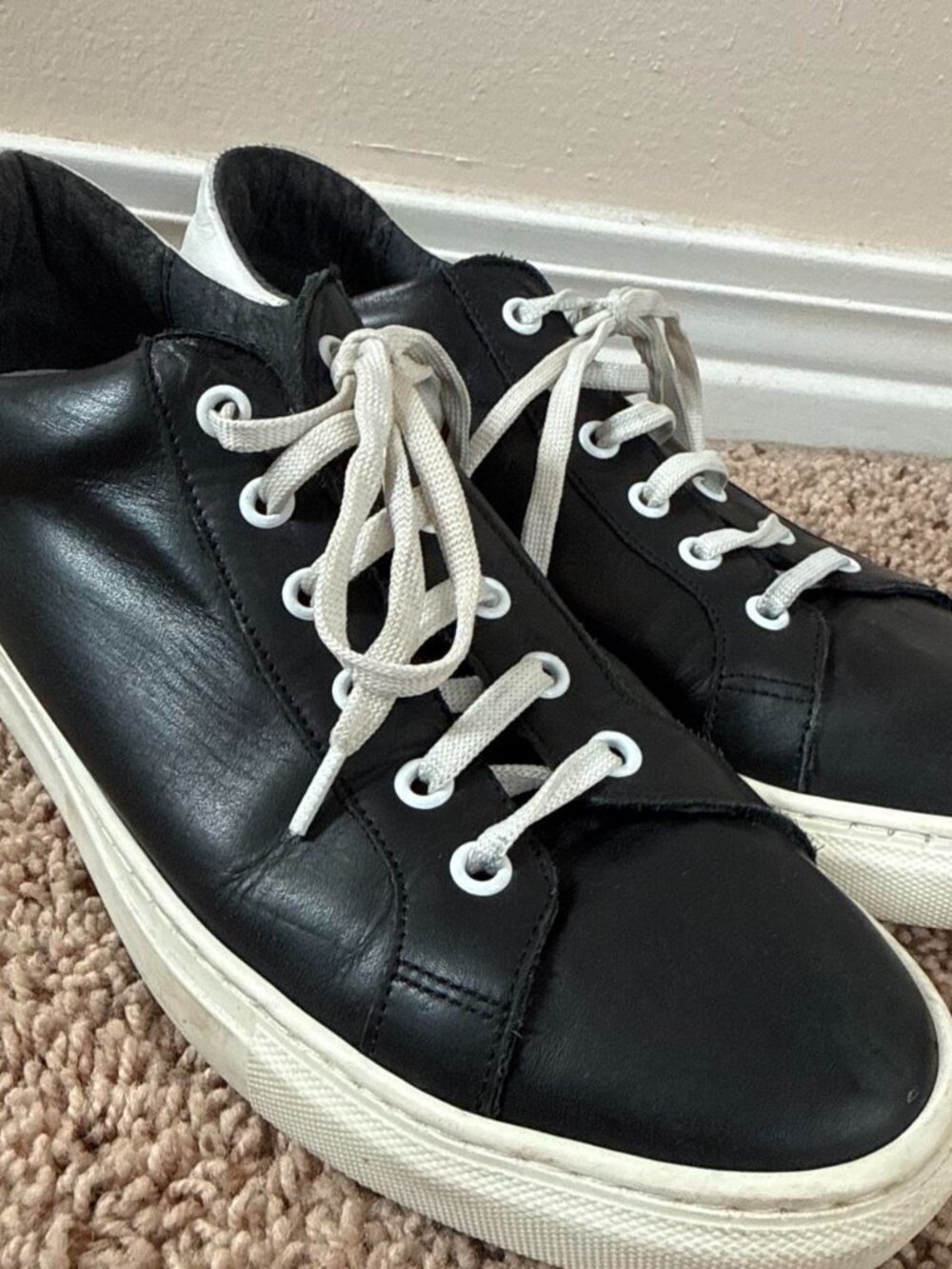 Black leather sneakers with white laces #sneakers #leather